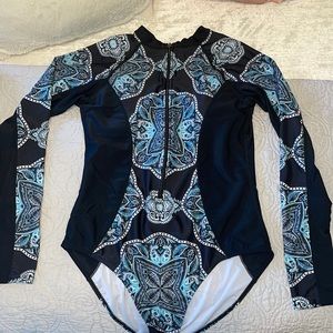 Long sleeve one-piece swimsuit. Size L